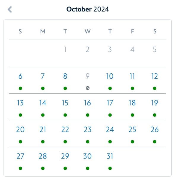 A calendar for October 2024, displaying the days of the week from Sunday to Saturday, with green dots marking specific dates and an empty circle on October 9. Disney Reservations Hurricane Milton