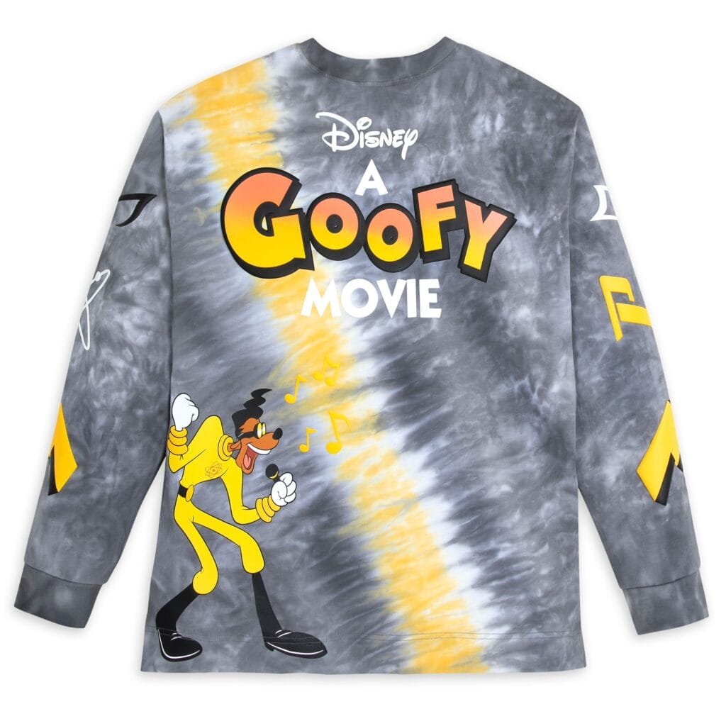 A long-sleeve, tie-dye shirt featuring the title 'A Goofy Movie' in large, bold lettering on the back, accompanied by a cartoon character styled like Goofy singing into a microphone. The design includes various graphic elements in yellow and gray hues on a grey background.